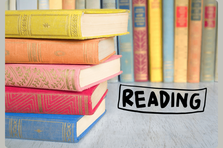 A stack of colorful books next to a bookshelf of books, with the word "Reading" overlaid.