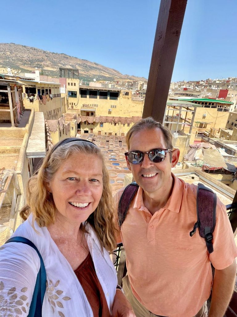 Couple overlooking Chouara Tanneries in the Fes medina, Morocco.